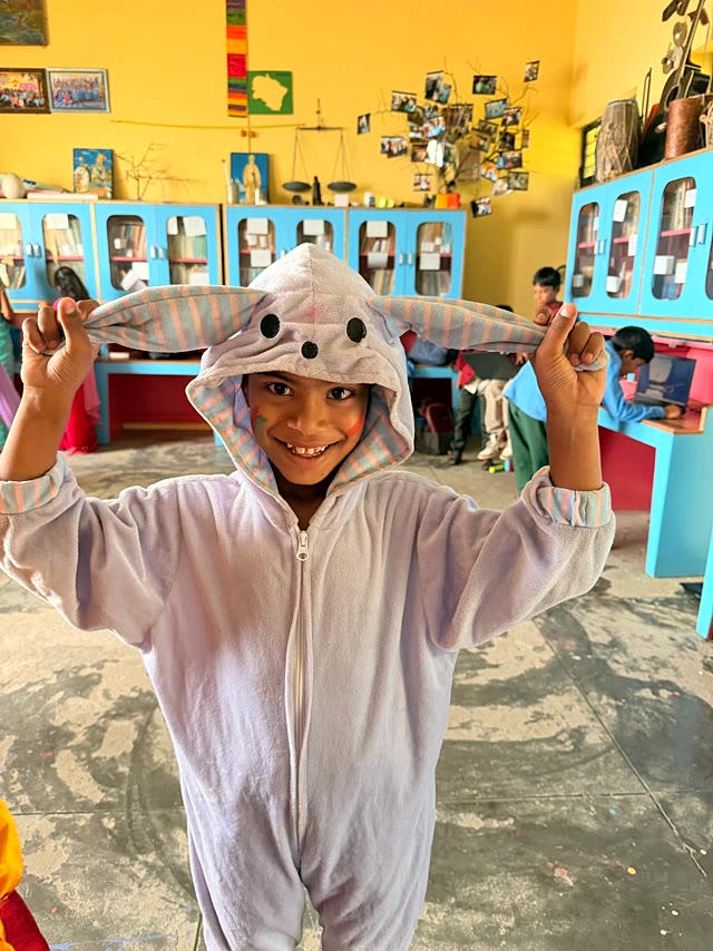 A young student in a bunny costume