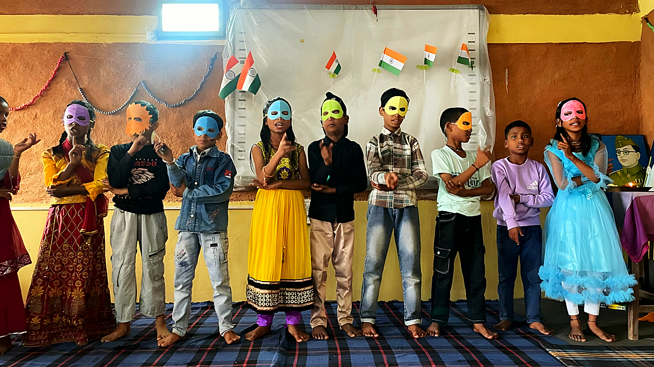 Students in a line wearing colourful masks